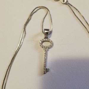 14 carat white gold chain with white gold key